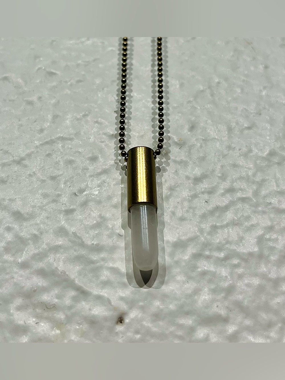 Gold Capsule Pendant Necklace with Frosted Glass Vial